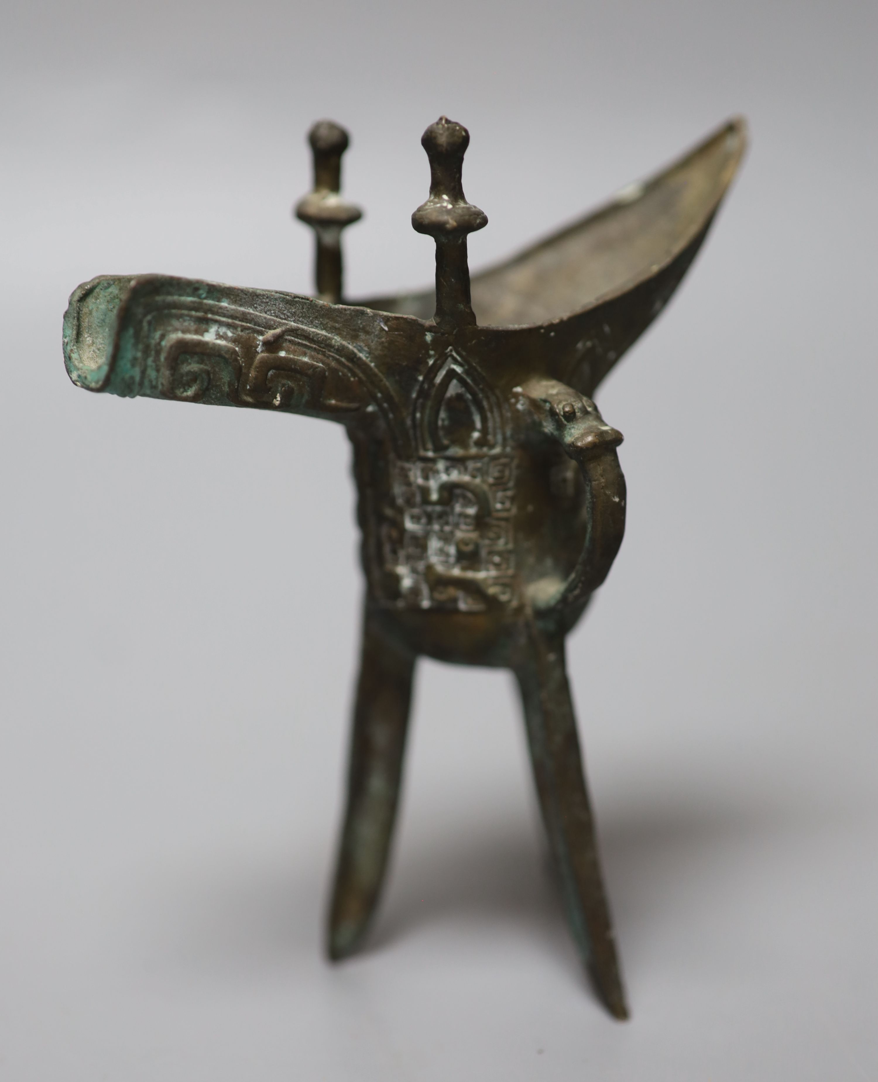 A hardstone censer, a Chinese bronze deity and a bronze jue, tallest 13cm,